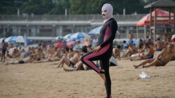 الصين.. السجن عقوبة التعري على الشاطئ 1 557638