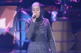 والدة نداء شرارة الفائزة بلقب The Voice : هذه حقيقة خلع ابنتي الحجاب نداء شراره