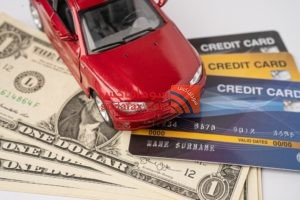 red car credit card us dollar banknote1