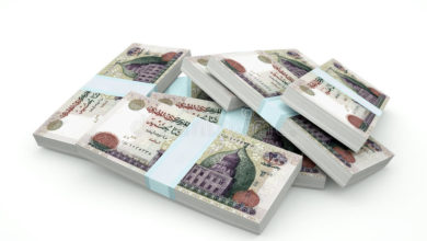 تقرير: السودان بالمركز 150 عالميا بمؤشر (الرشوة) piles egypt money isolated white background d rendered banknotes 85222789